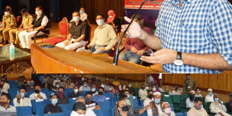DC Srinagar interacts with transporters, auto-rickshaw operators