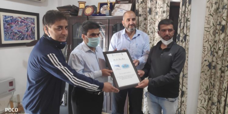 Dir Tourism felicitates employee for completing life saving technique, powerboat handling courses