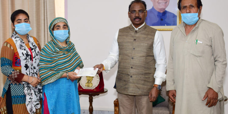 Lt Governor hands over ex-gratia relief to NoK’s of Martyr Sarpanch Ajay Pandita