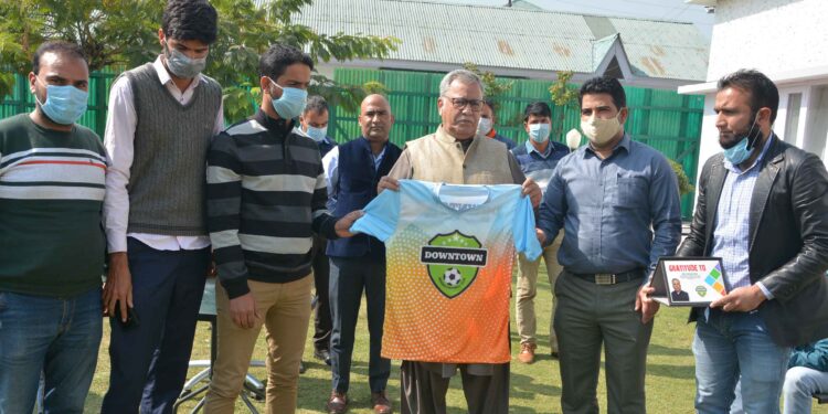 Advisor Khan felicitates Basit Bilal for topping NEET from J&K